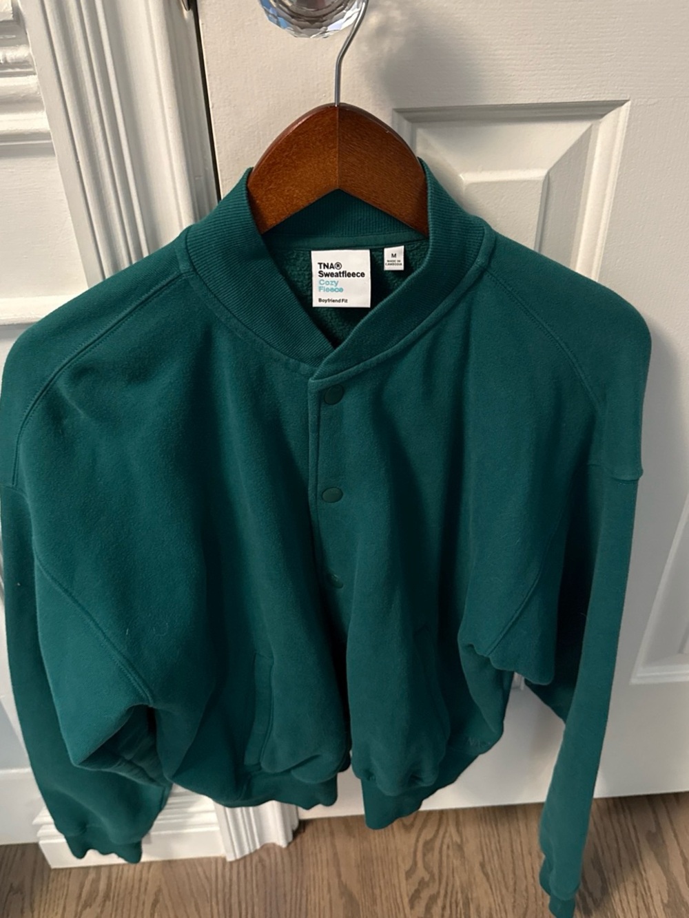 TNA Women’s Sweatfleece Snap-Front in Green, with pockets.
